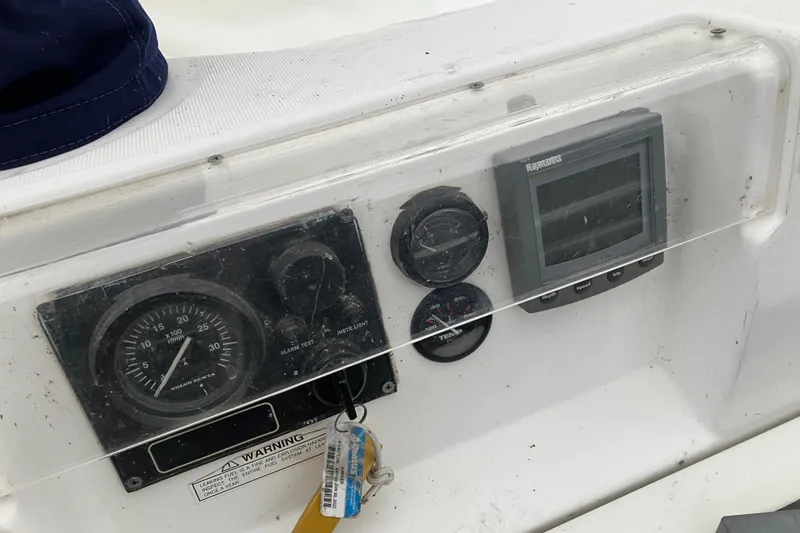 Slide: The Image of Control panel of a 2005 Beneteau Oceanis 423 sailboat with gauges and display. - 46