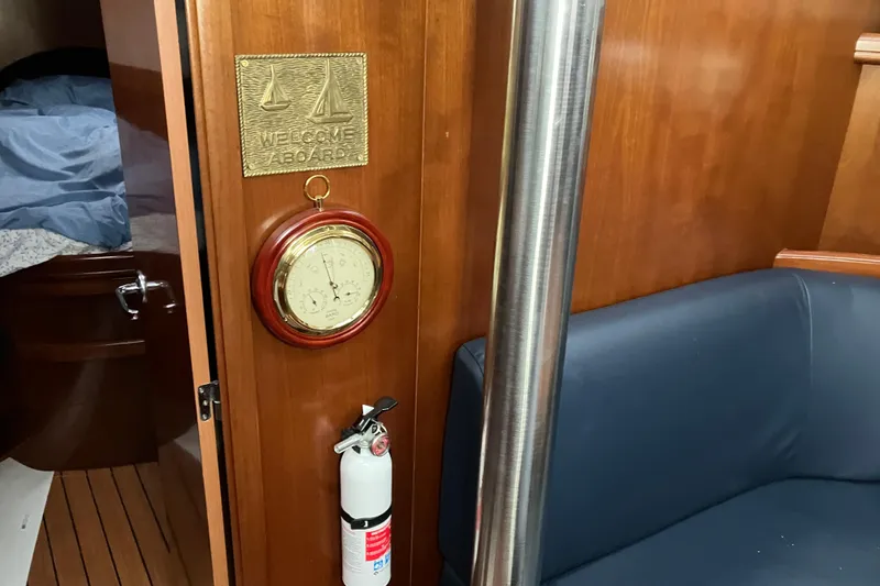 Slide: The Image of Interior of 2005 Beneteau Oceanis 423 yacht with barometer and fire extinguisher. - 6