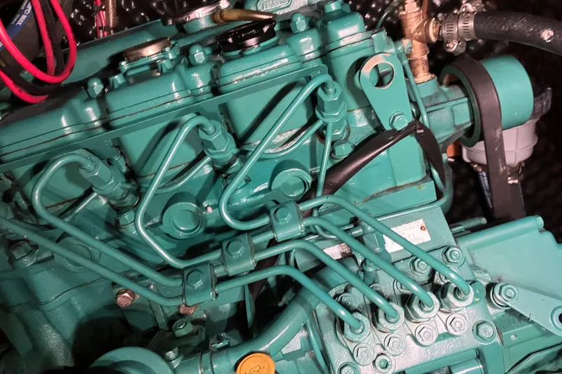 Slide: The Image of Engine of a 2005 Beneteau Oceanis 423 sailboat, showcasing intricate mechanical components. - 32