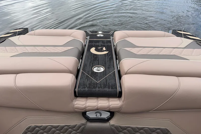 Slide: The Image of 2026 Centurion Ri245 boat interior with luxurious beige and gray seating, sleek design. - 20