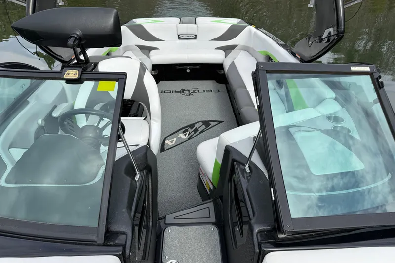 Slide: The Image of 2015 Centurion Enzo FS44 boat interior with seating and steering wheel. - 25