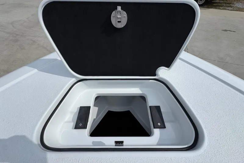 Slide: The Image of Open storage compartment on 2026 Yellowfin 34 Offshore boat deck. - 26