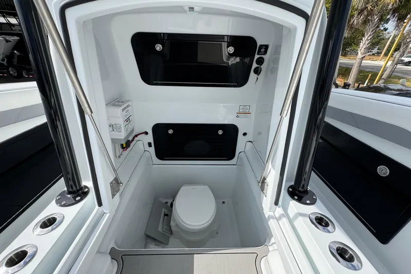 Slide: The Image of 2026 Yellowfin 34 Offshore boat interior with toilet and storage compartments. - 30