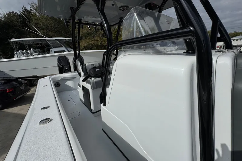 Slide: The Image of 2026 Yellowfin 34 Offshore boat, sleek design, spacious deck, modern features. - 32