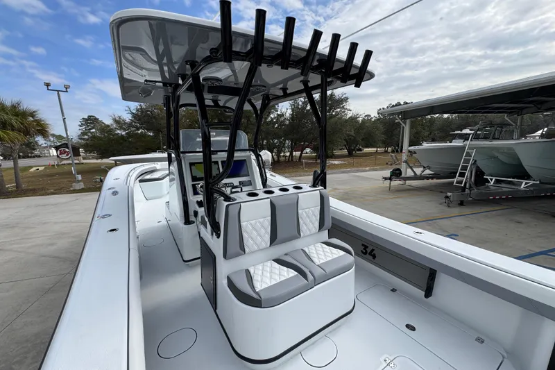 Slide: The Image of 2026 Yellowfin 34 Offshore boat with sleek design and modern seating. - 43