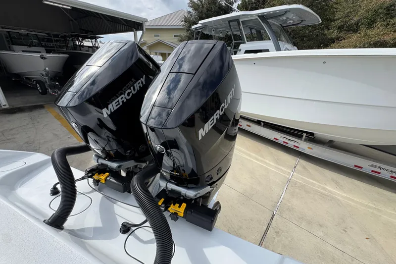 Slide: The Image of 2026 Yellowfin 34 Offshore with dual Mercury outboard engines on a trailer. - 52