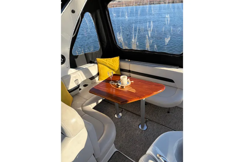 Slide: The Image of Interior view of 2001 Chaparral Signature 300 boat with helm and seating area. - 15