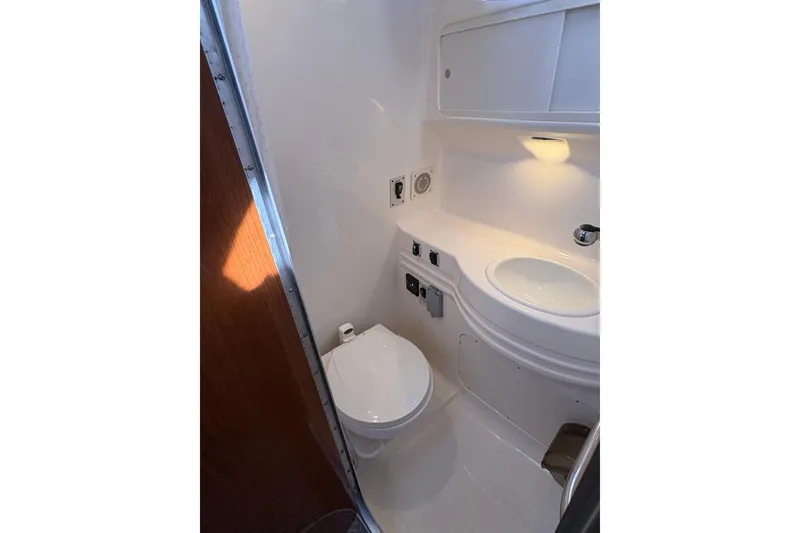 Slide: The Image of Electrical control panel on a 2001 Chaparral Signature 300 boat. - 33