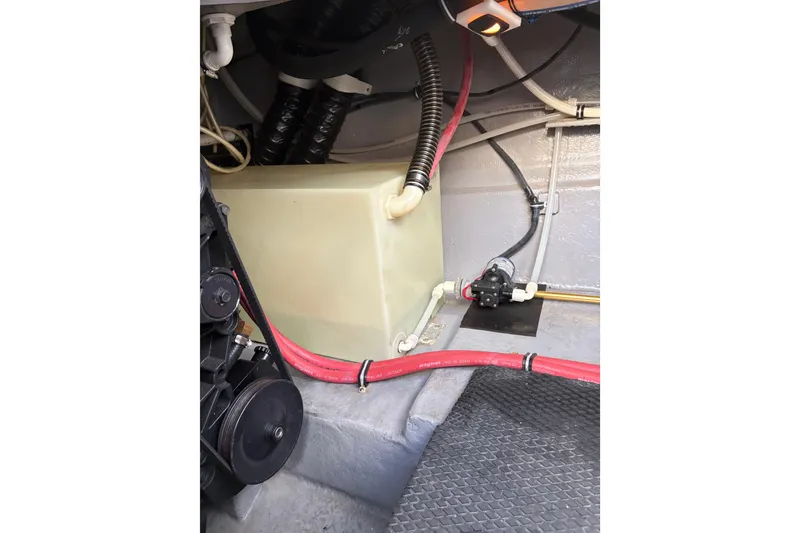 Slide: The Image of Engine compartment of 2001 Chaparral Signature 300 with batteries and wiring. - 40