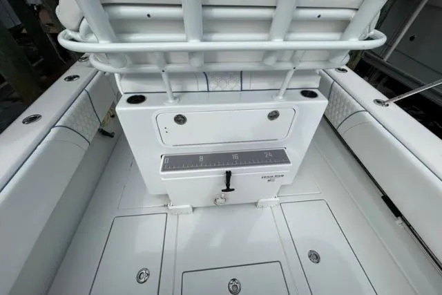 Slide: The Image of 2023 Contender 28 Tournament boat interior with seating and storage compartments. - 16