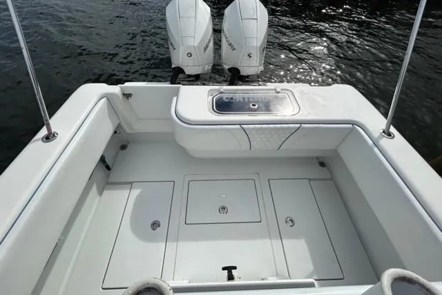 Slide: The Image of 2023 Contender 28 Tournament boat with dual engines and spacious deck layout. - 22