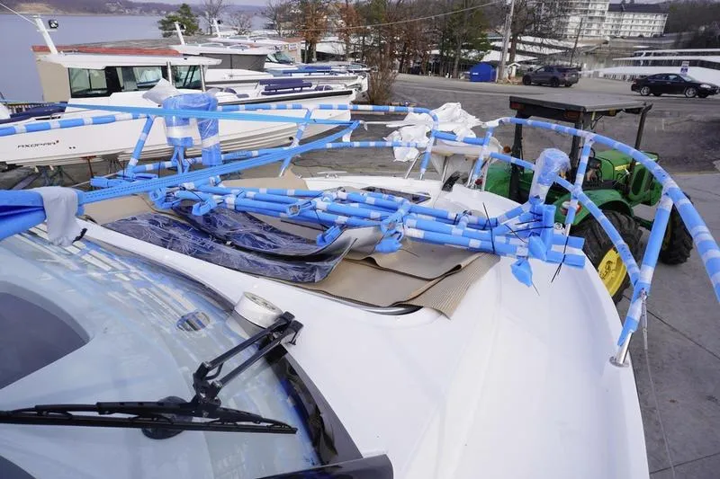 Slide: The Image of Interior of 2026 Beneteau Antares 11 Fly, featuring modern helm and galley area. - 10