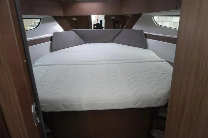 Slide: The Image of 2026 Beneteau Antares 11 Fly helm with Garmin display and controls. - 21