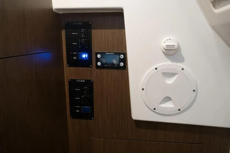Slide: The Image of Control panel on 2026 Beneteau Antares 11 Fly yacht interior, featuring modern navigation equipment. - 25