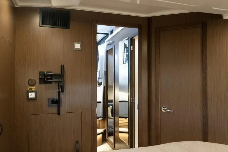 Slide: The Image of Interior of 2026 Beneteau Antares 11 Fly, featuring sleek wood paneling and modern design. - 33