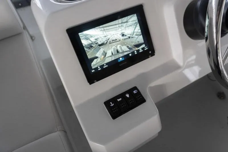 Slide: The Image of 2026 Beneteau Antares 11 Fly dashboard with touchscreen and control panel. - 44