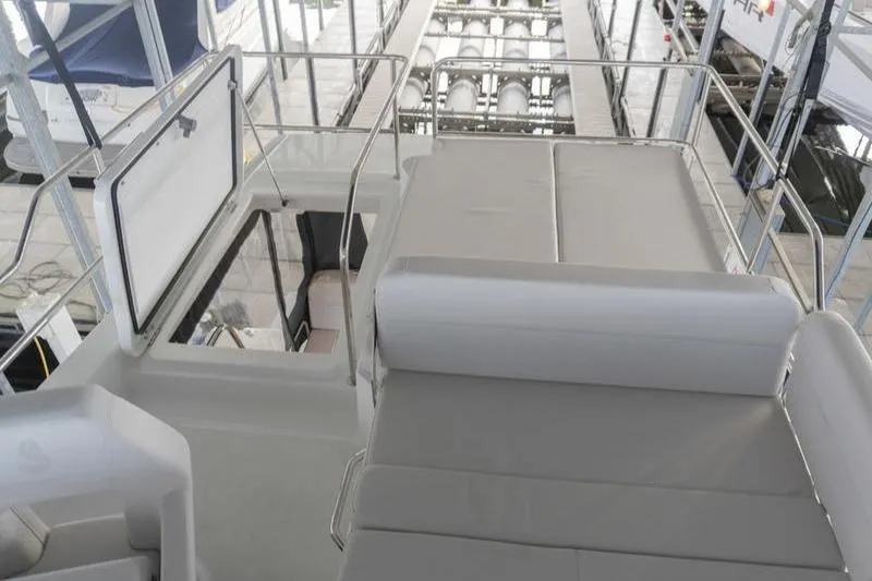 Slide: The Image of 2026 Beneteau Antares 11 Flybridge with sleek seating and modern design. - 46