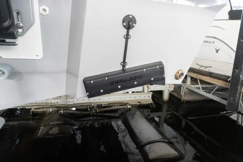 Slide: The Image of 2026 Beneteau Antares 11 Fly with Zipwake trim system at dock. - 50