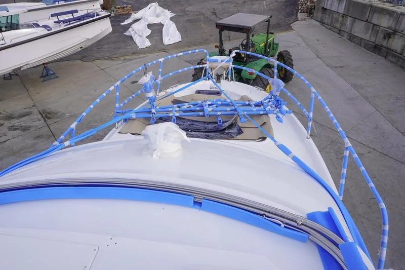 Slide: The Image of Interior of 2026 Beneteau Antares 11 Fly, featuring modern seating and helm station. - 9