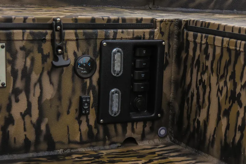 Slide: The Image of Control panel of 2026 Excel 1751 Shallow Water F4 boat with camouflage design. - 13