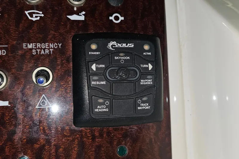 Slide: The Image of Control panel of a 2010 Sea Ray Sundancer 310 boat with Axius system. - 15