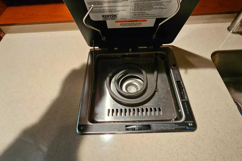 Slide: The Image of Luxurious interior of 2010 Sea Ray Sundancer 310 yacht with spacious seating and modern amenities. - 24