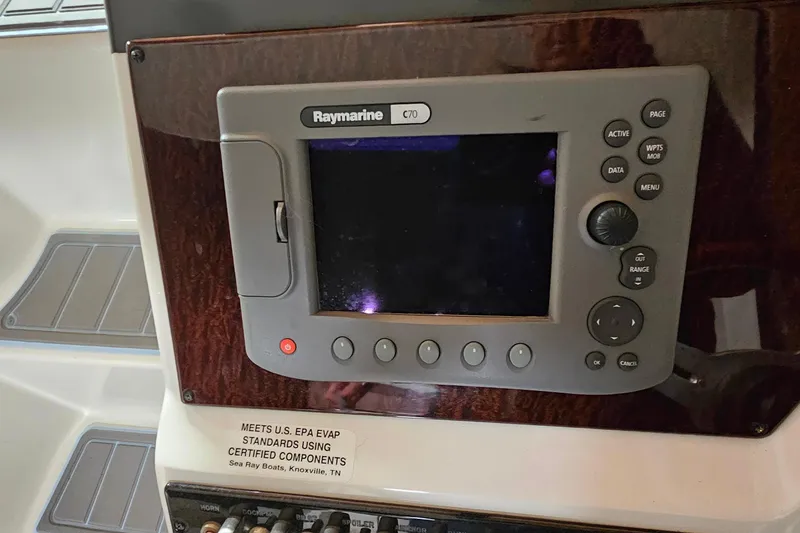 Slide: The Image of Raymarine C70 navigation system on 2010 Sea Ray Sundancer 310 boat dashboard. - 9