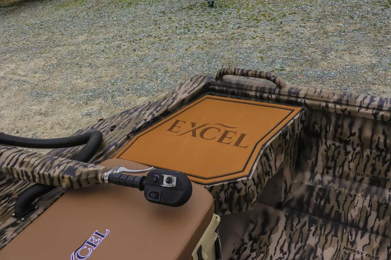 Slide: The Image of Camouflage-patterned Excel 1751 F4 Pro boat interior, 2026 model, with logo detail. - 12