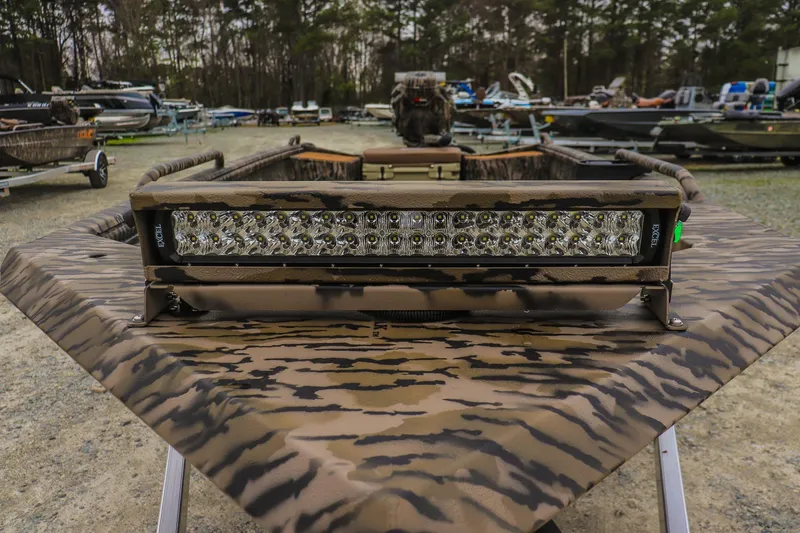 Slide: The Image of Camouflage-patterned Excel 1751 F4 Pro boat with LED light bar, 2026 model. - 9