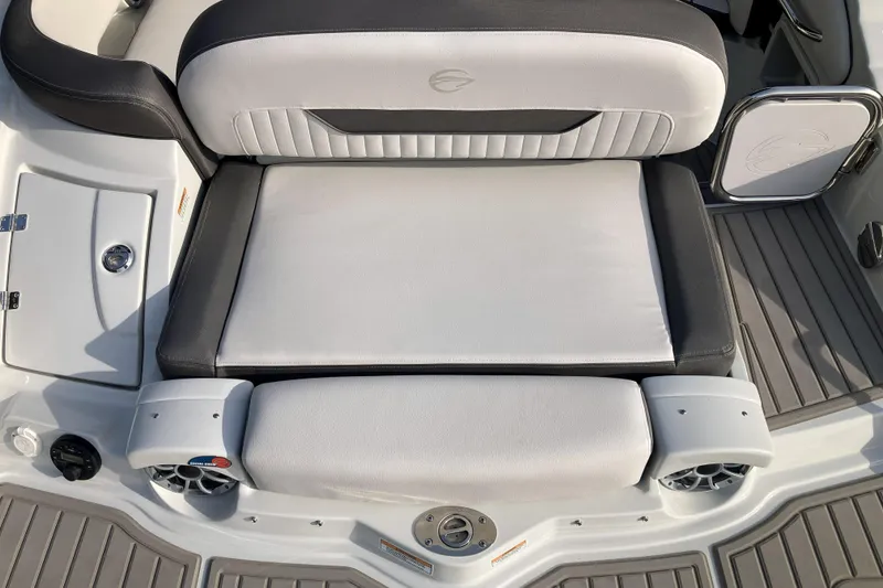 Slide: The Image of 2026 Crownline 220 SS boat interior with cushioned seating and sleek design. - 6