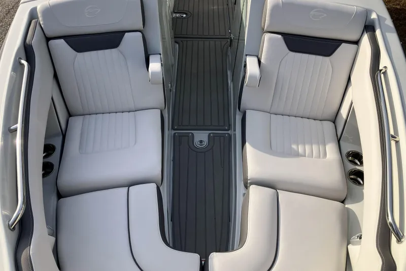 Slide: The Image of 2026 Crownline 220 SS boat interior with sleek, modern seating and elegant design. - 8