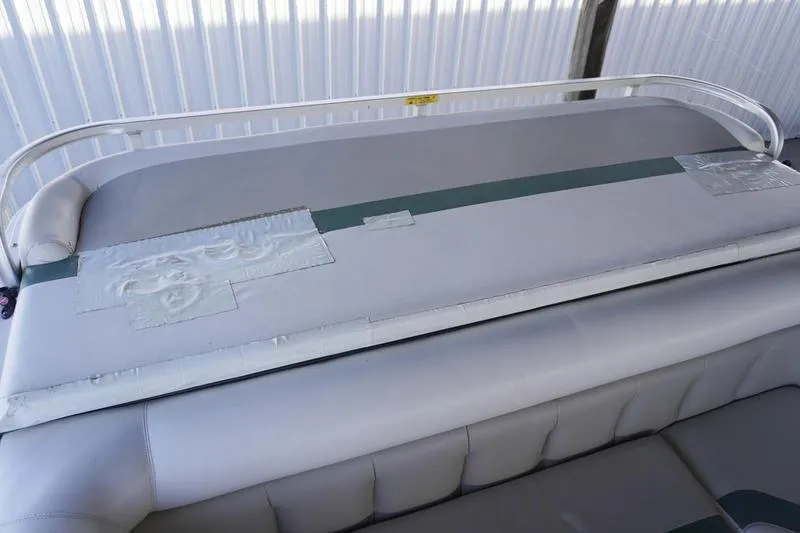 Slide: The Image of 2000 Sundancer Pontoons 240 Majestic boat seat with duct tape repair. - 28