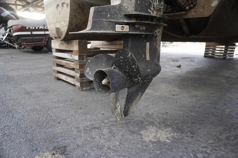 Slide: The Image of Close-up of a 2000 Sundancer Pontoons 240 Majestic boat propeller. - 6