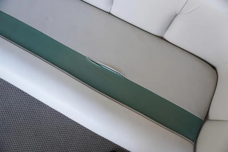 Slide: The Image of Torn seat upholstery on 2000 Sundancer Pontoons 240 Majestic boat. - 8