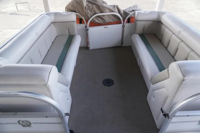 Slide: The Image of Interior of 2000 Sundancer Pontoons 240 Majestic with spacious seating and carpeted floor. - 9
