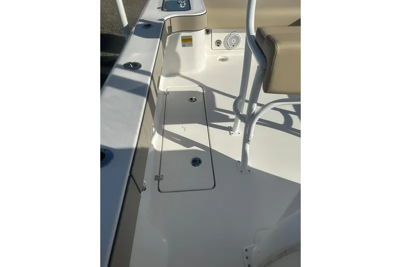 Slide: The Image of 2026 Delta Boatworks Delta D245 interior deck with seating and storage compartments. - 12