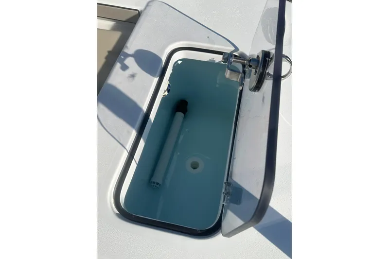 Slide: The Image of Open storage compartment on 2026 Delta Boatworks Delta D245 boat. - 15