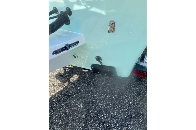 Slide: The Image of 2026 Delta Boatworks Delta D245 boat rear view with trailer attachment. - 7