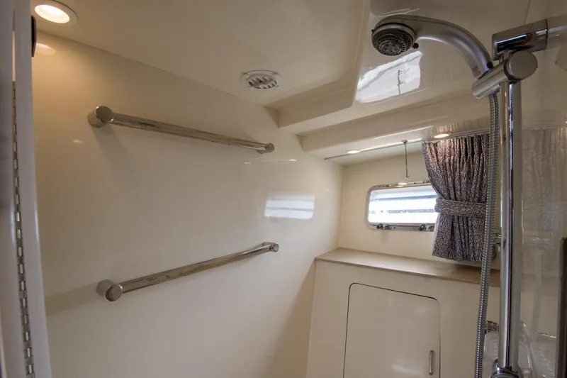 Slide: The Image of Bathroom interior of 2000 Fleming 55 yacht with shower and window. - 21