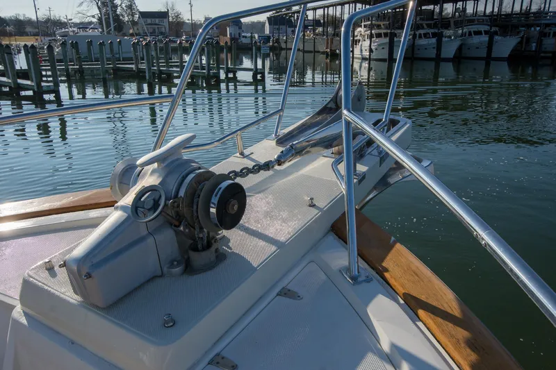Slide: The Image of Bow of 2000 Fleming 55 yacht with anchor and winch at marina. - 46