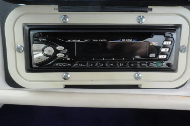 Slide: The Image of 1997 Caravelle Interceptor 232 dashboard with JVC KD-S550 stereo system. - 13