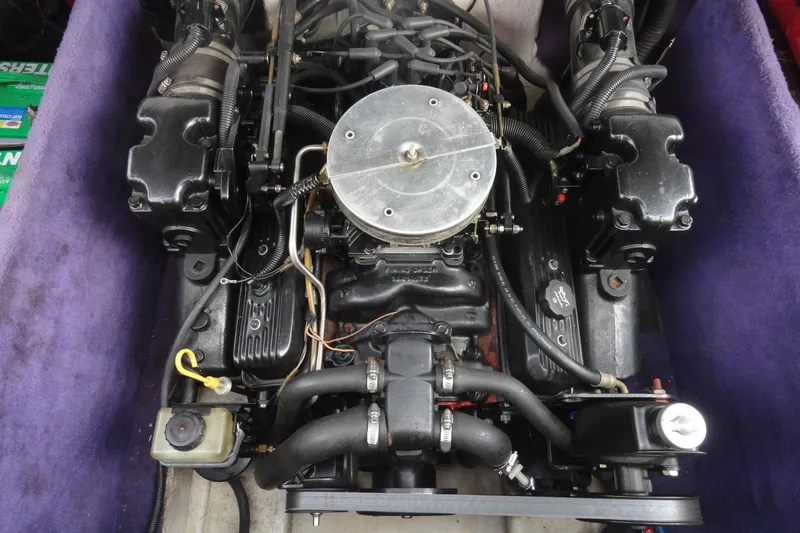 Slide: The Image of 1997 Caravelle Interceptor 232 engine with detailed components and wiring. - 19