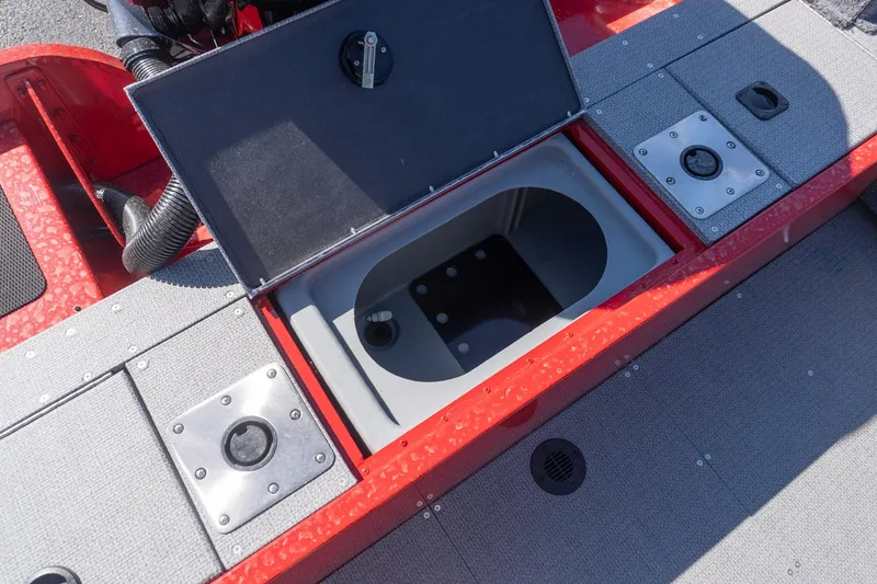 Slide: The Image of Open storage compartment on 2026 G3 Angler V21 F boat deck. - 13
