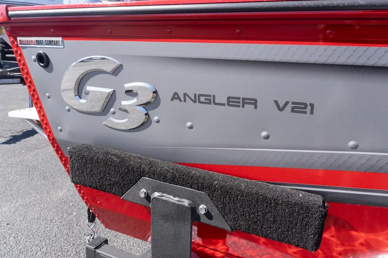 Slide: The Image of 2026 G3 Angler V21 F boat, red and gray exterior detail. - 16