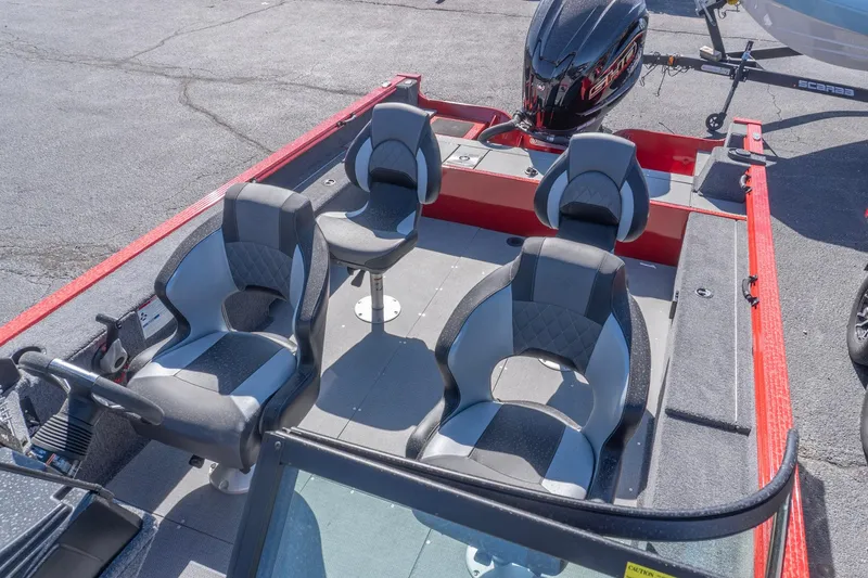 Slide: The Image of 2026 G3 Angler V21 F boat interior with four cushioned seats and motor. - 9