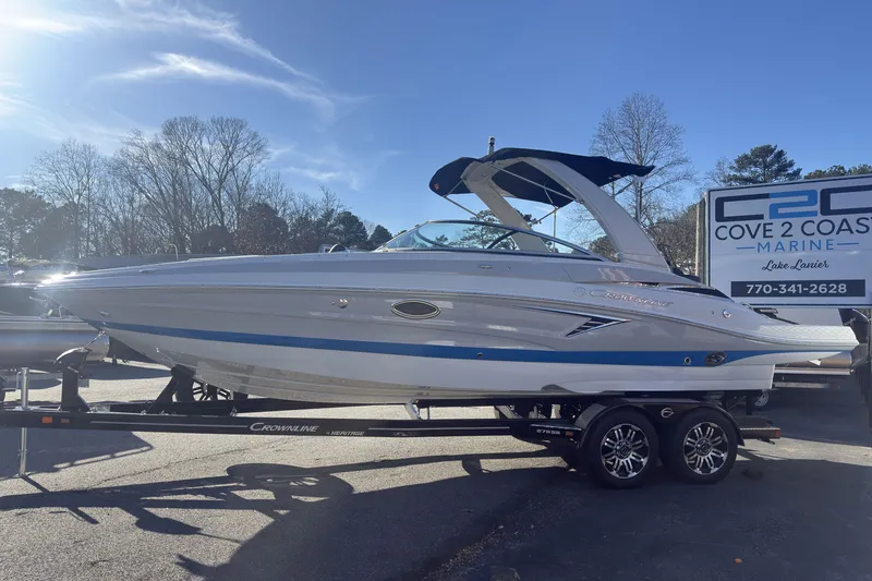 Slide: The Image of 2026 Crownline 278 SS boat on trailer at Cove 2 Coast Marine dealership. - 4