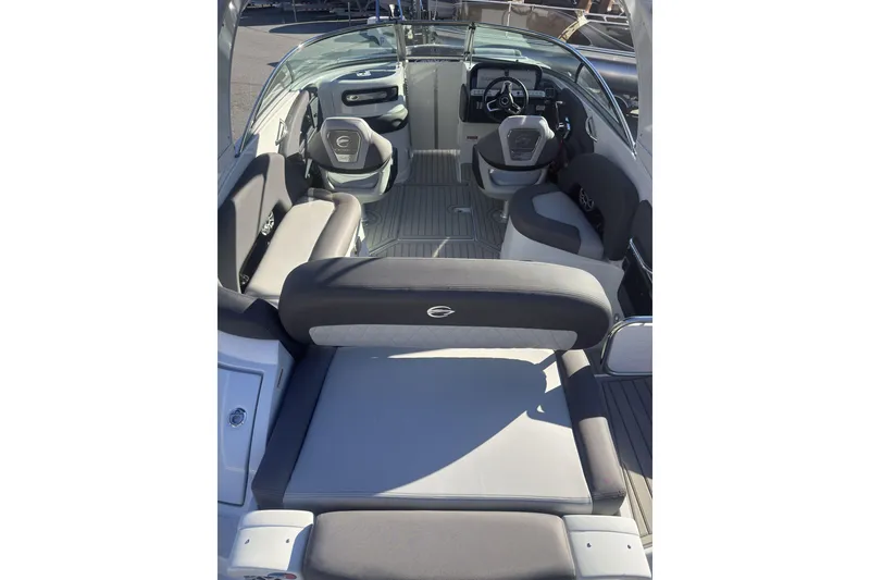 Slide: The Image of 2026 Crownline 278 SS boat interior with modern seating and steering wheel. - 5