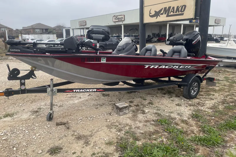 The Image of 2021 Tracker Pro Team 175 TXW boat on trailer, displayed outdoors. - 0