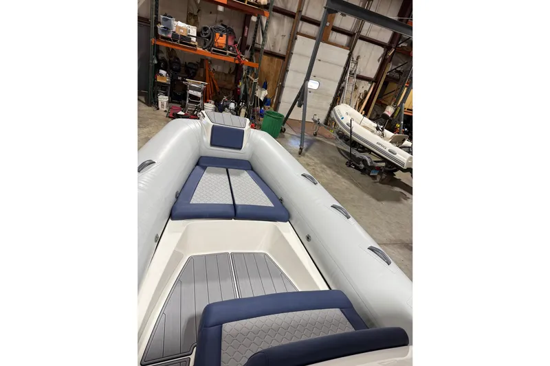 Slide: The Image of Interior view of a 2026 Brig Eagle 8 inflatable boat in a workshop. - 3