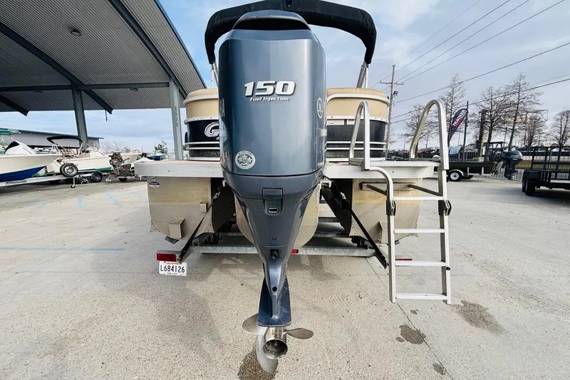 Slide: The Image of 2014 SunCatcher V322 RC pontoon boat with 150 HP outboard motor and swim ladder. - 4